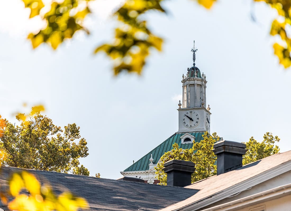 Colonial Heights, VA - Autumn Tree Leaves Framing Tower of Old Building Architecture in the Commonwealth of Virginia